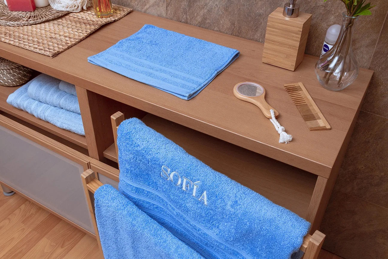 display de toallas de bano set azul